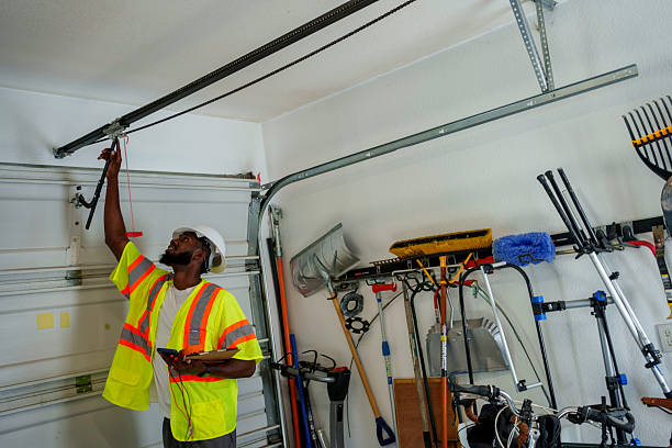 Professional Garage Door Roller Replacement technician working in Sackets Harbor, NY
